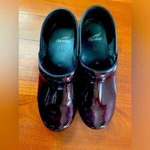 Dark wine colored Dansko clogs